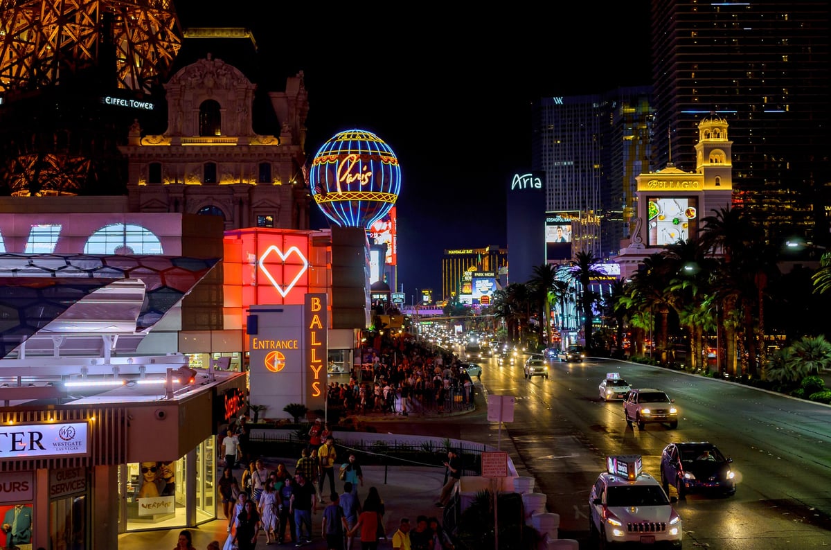 Las Vegas Strip at night with bright lights and attractions near Bellagio hotel